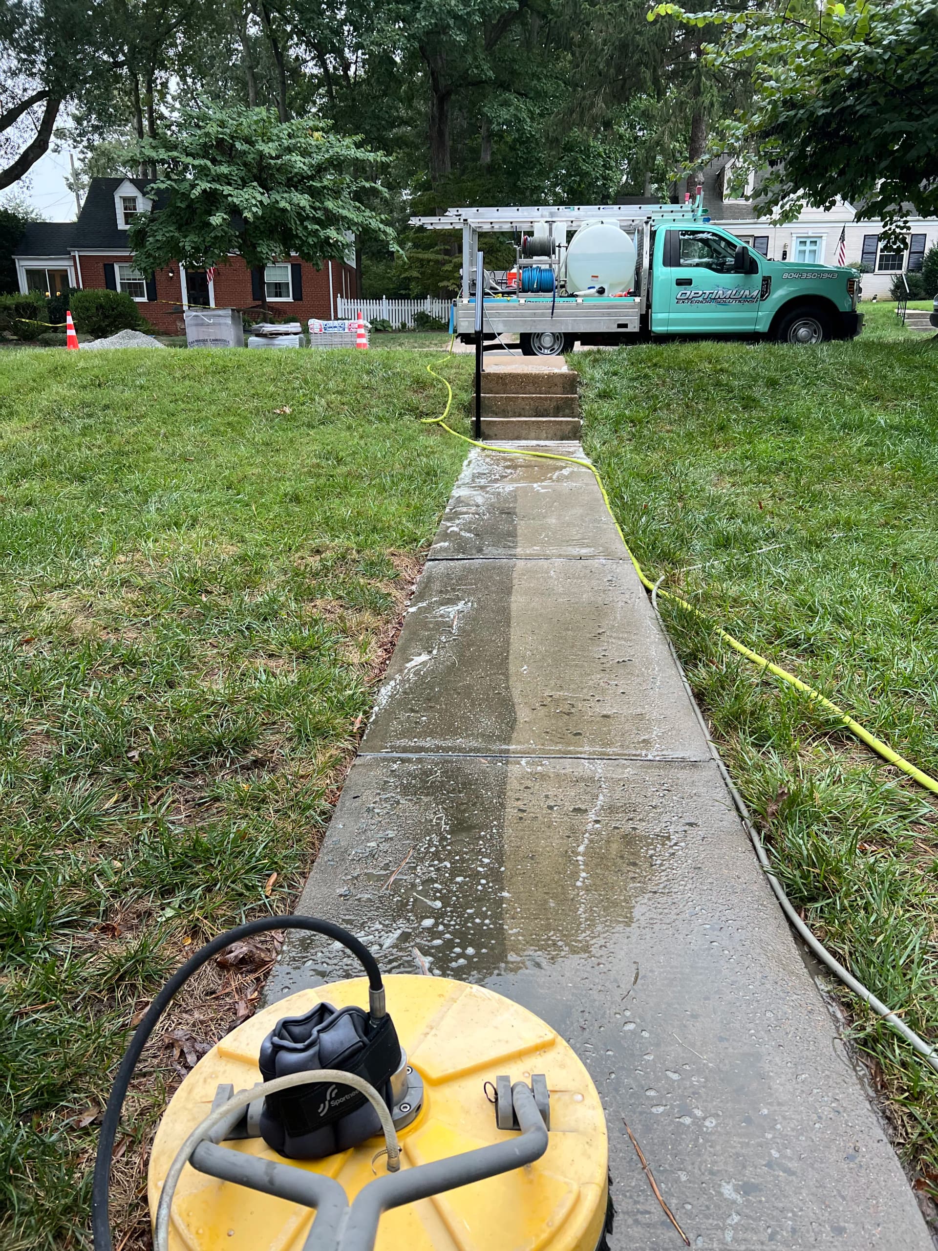 We Don't Let a Little Rain Stop a Concrete Cleaning Job image
