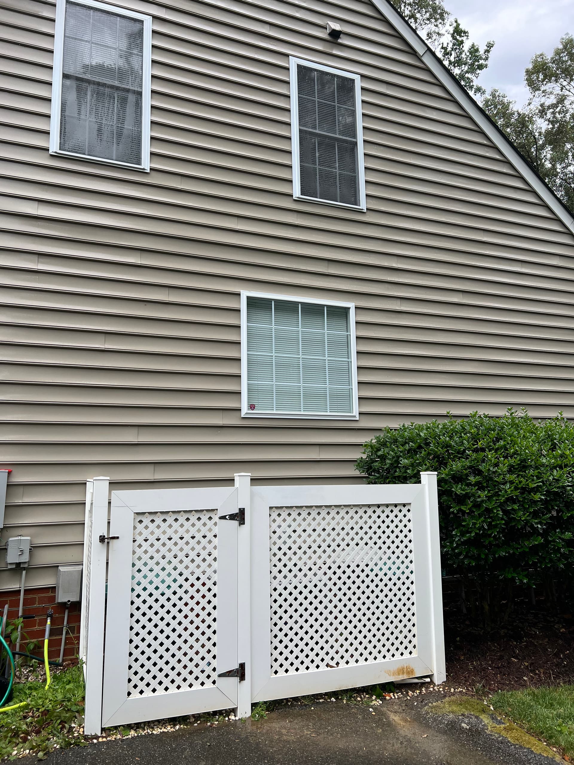 Gallery photos for Algae-Covered Siding and Shed Get a Full House Washing Reset: Image #1
