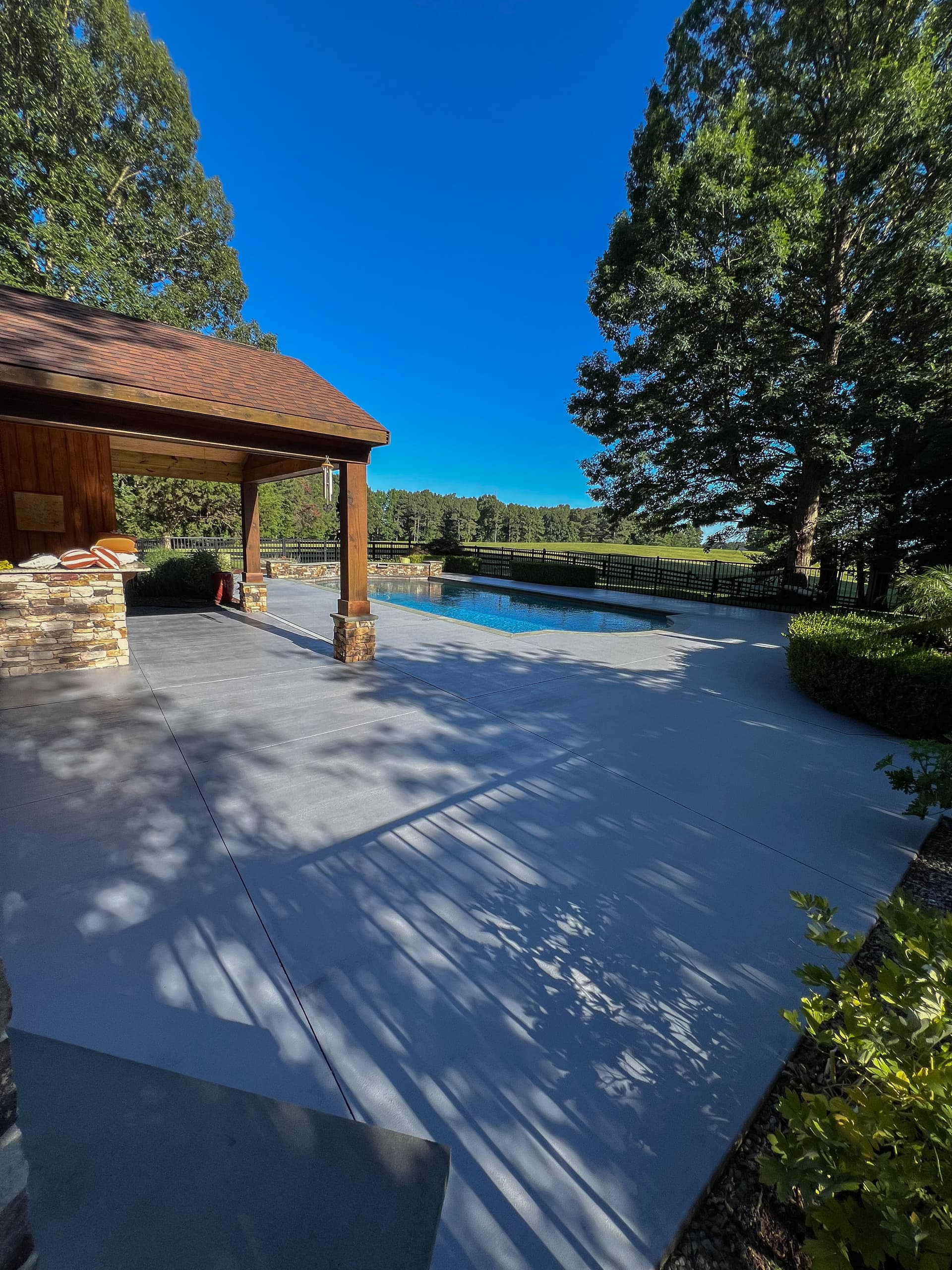Pool Deck Cleaned, Stained, and Sealed for Summer image