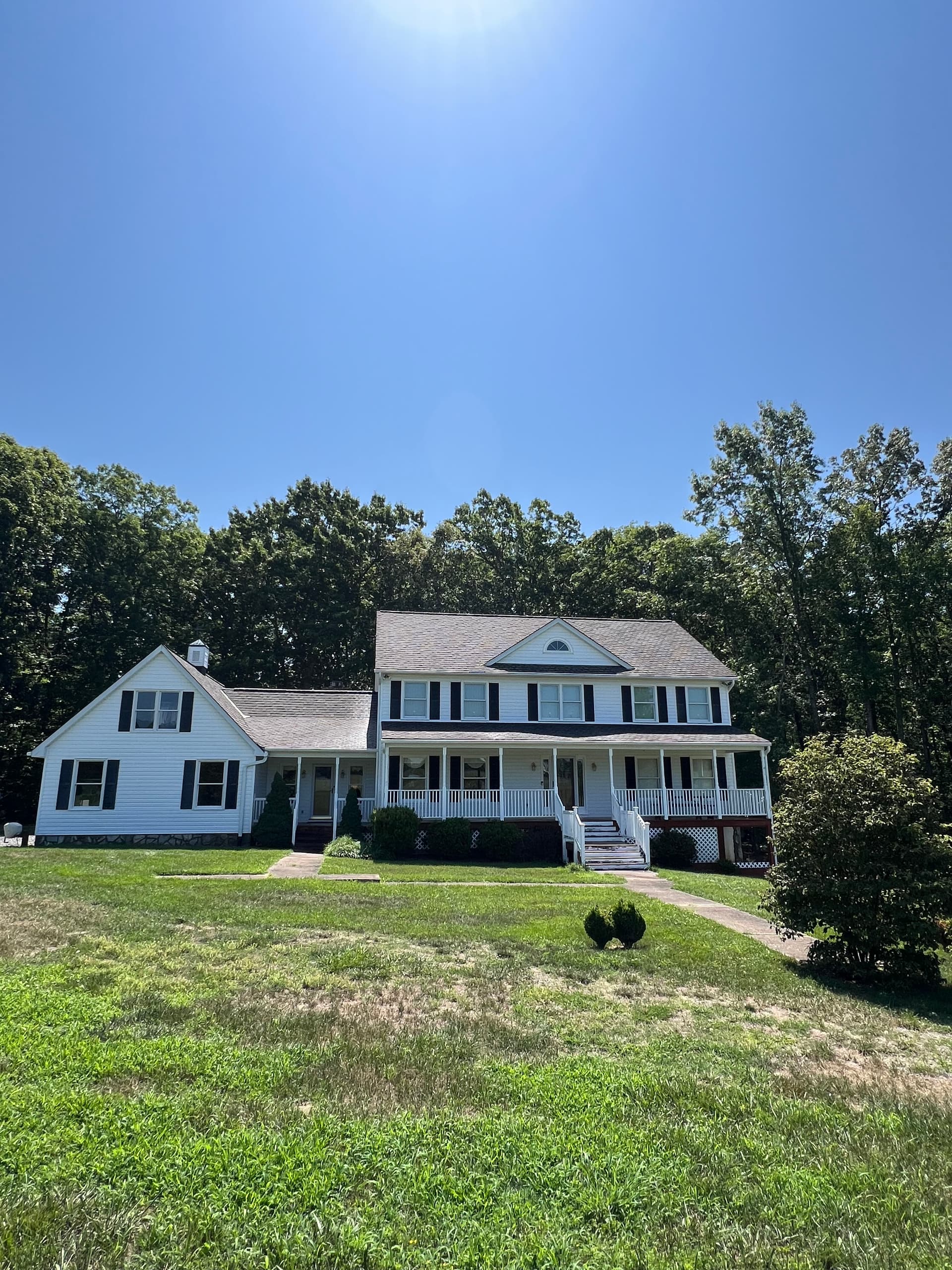 Full Property Wash - Roof, Siding, Trex Deck, Barn and Brick Walls image